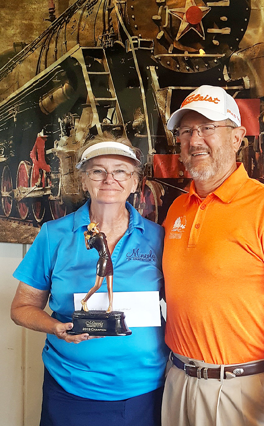 Mineola Country Club held its Ladies Championship Golf Tournament recently. Pictured is Ladies Champion Sandy Carter with club manager Allen Brock. Senior Champion is Rexanne Harless, Super Senior Champion is Deb Casburn and Low Net Champion is Lisa Drake.